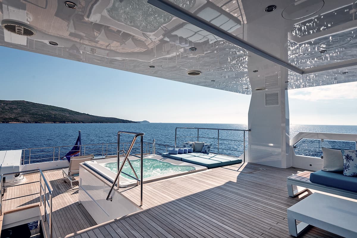 Deck seating aboard Motor Yacht Serenitas in evening light